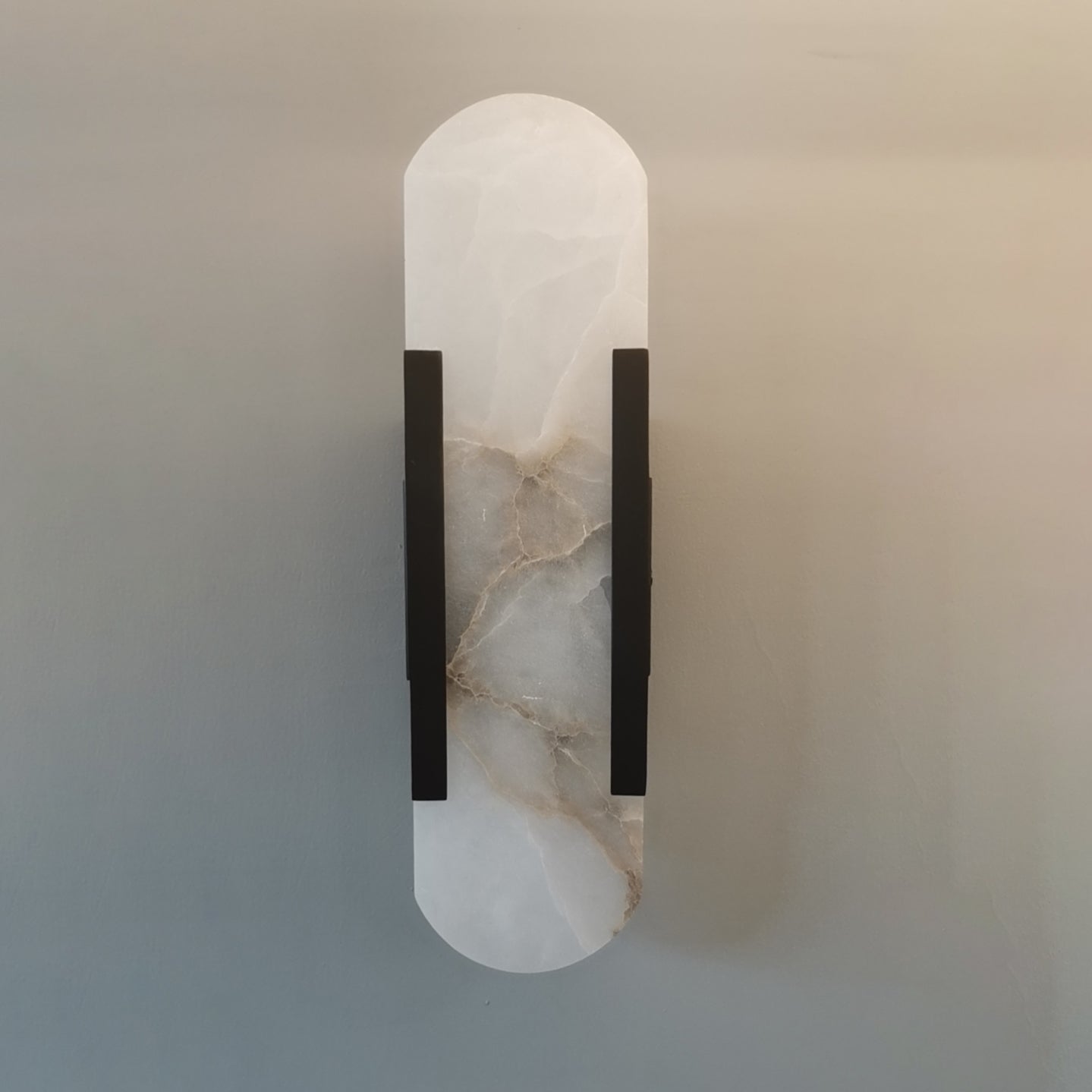 Oval Marble Wall Sconce with Soft LED Ambient Lighting