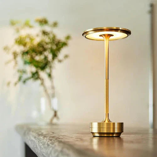 Wireless table lamp with circular metal shade