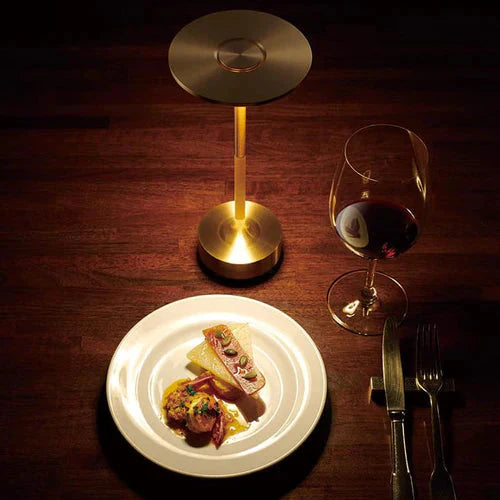 Wireless table lamp with circular metal shade