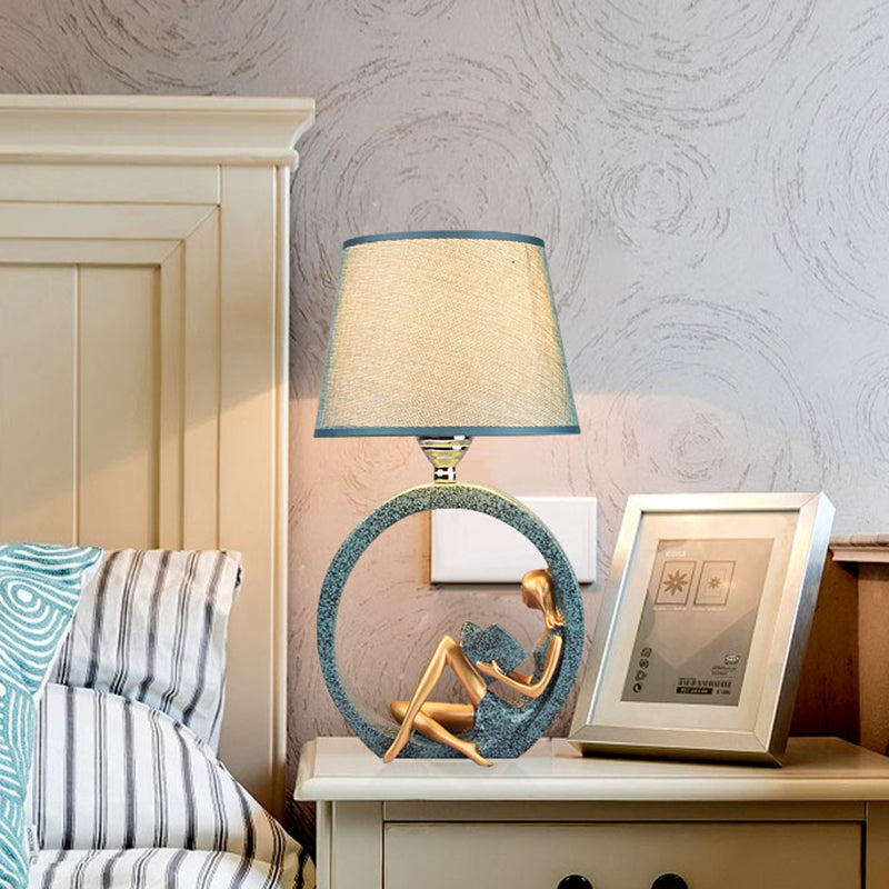 Blue Table Lamp with Girl Reading Figure