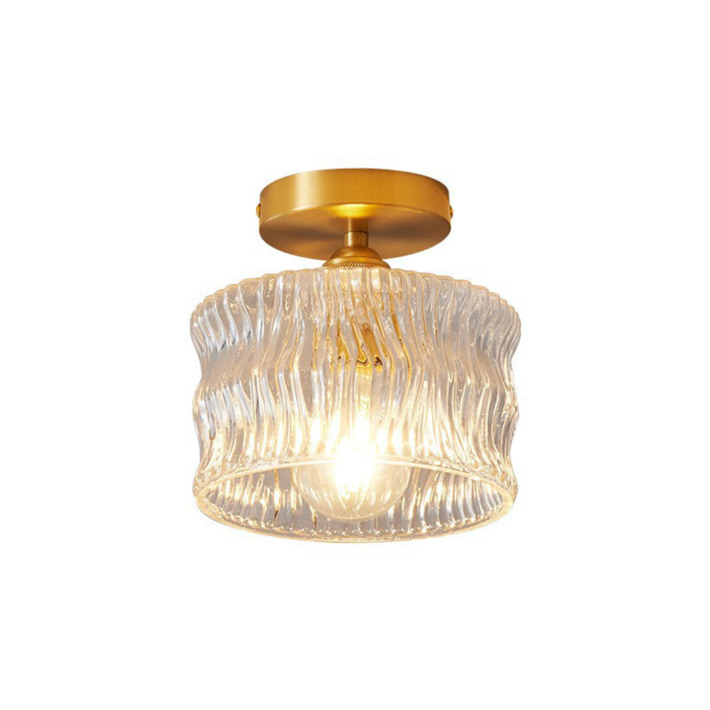 Élégant plafonnier en verre pour créer une ambiance dans la chambre