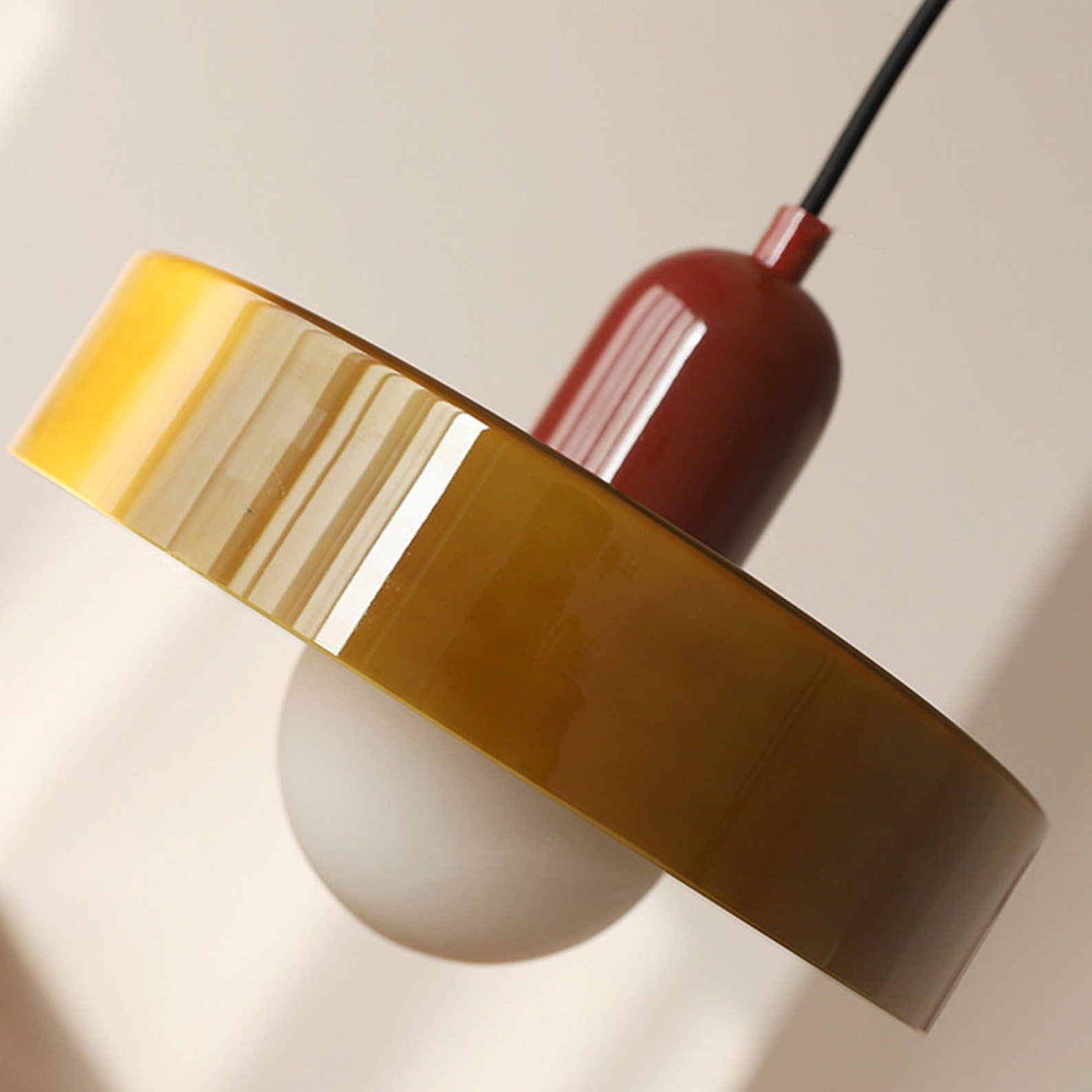 Hanging glass ceiling lamp with annular ring shade