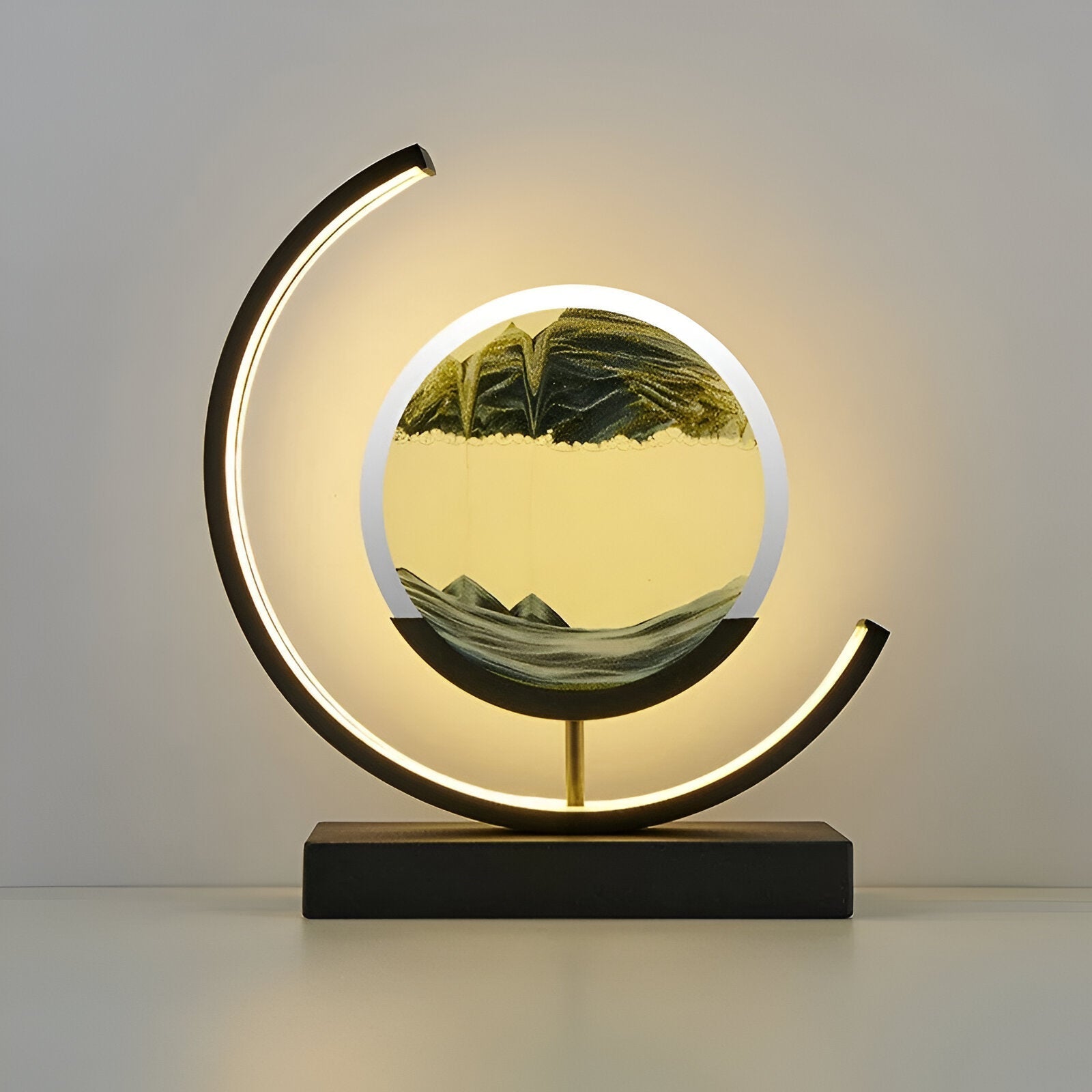 LED sand art table lamp with circular frame
