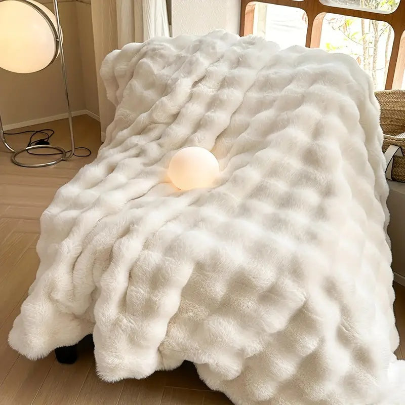 Long pile blanket with wavy textured surface