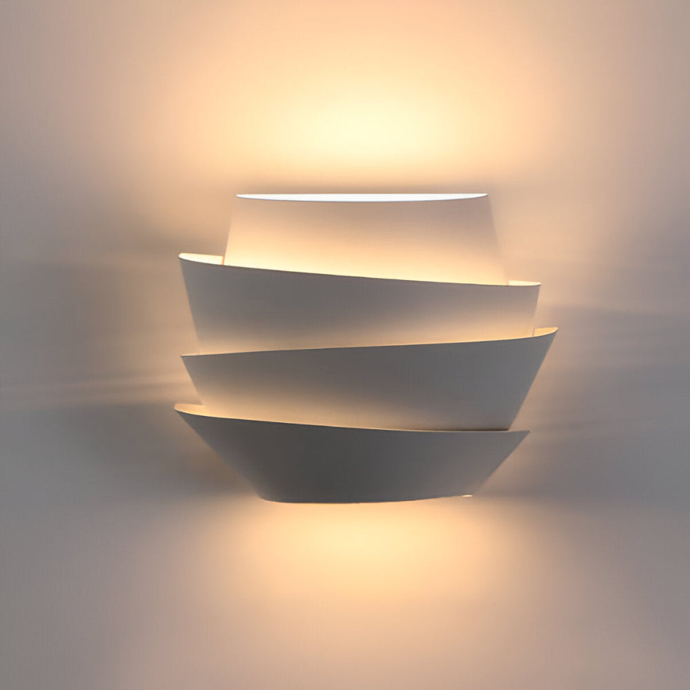 Modern wall lamp with overlapping curved panels