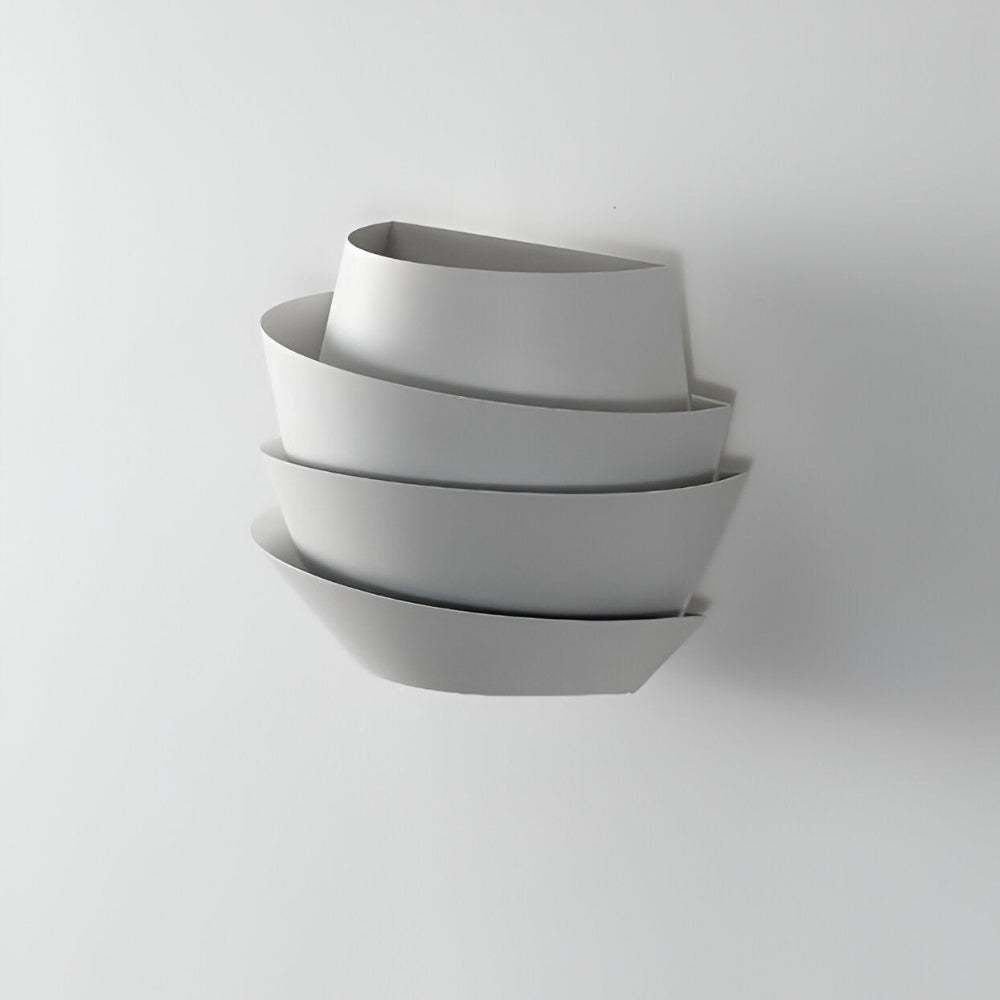 Modern wall lamp with overlapping curved panels