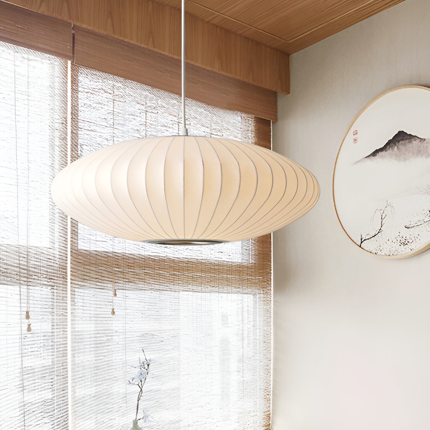 Oval pendant light with vertical lined shade
