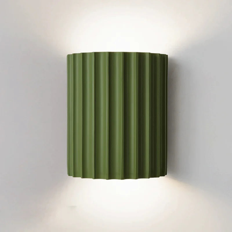 Resin wall light with grooved cylindrical design