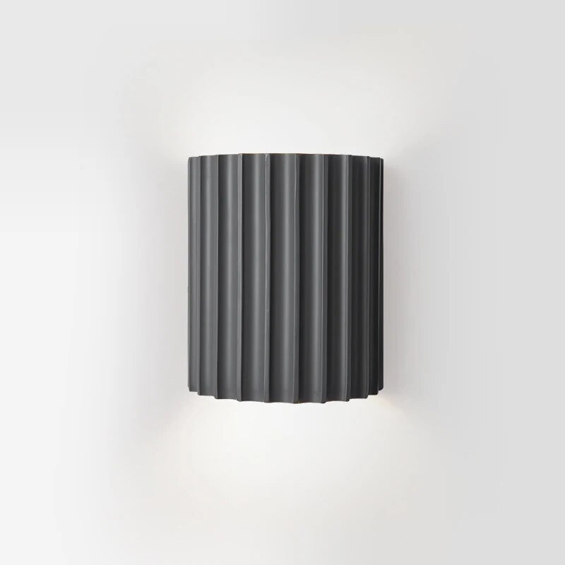 Resin wall light with grooved cylindrical design
