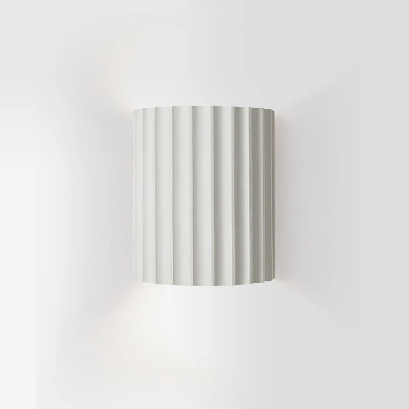 Resin wall light with grooved cylindrical design