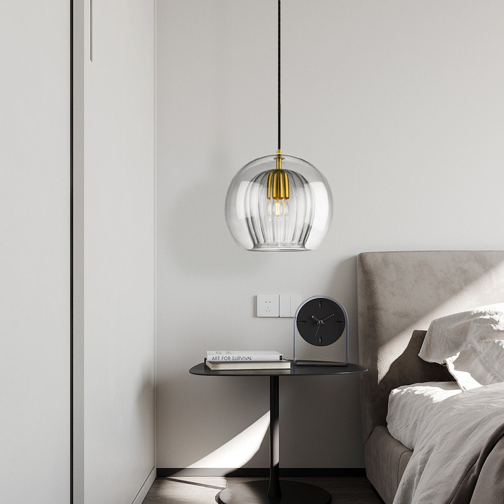 Round glass ceiling pendant with brass fitting