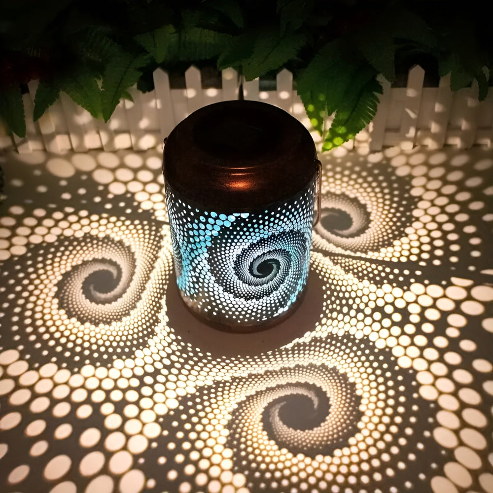 Solar garden light with spiral projection design