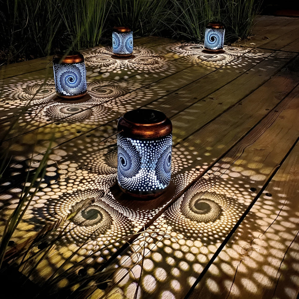 Solar garden light with spiral projection design