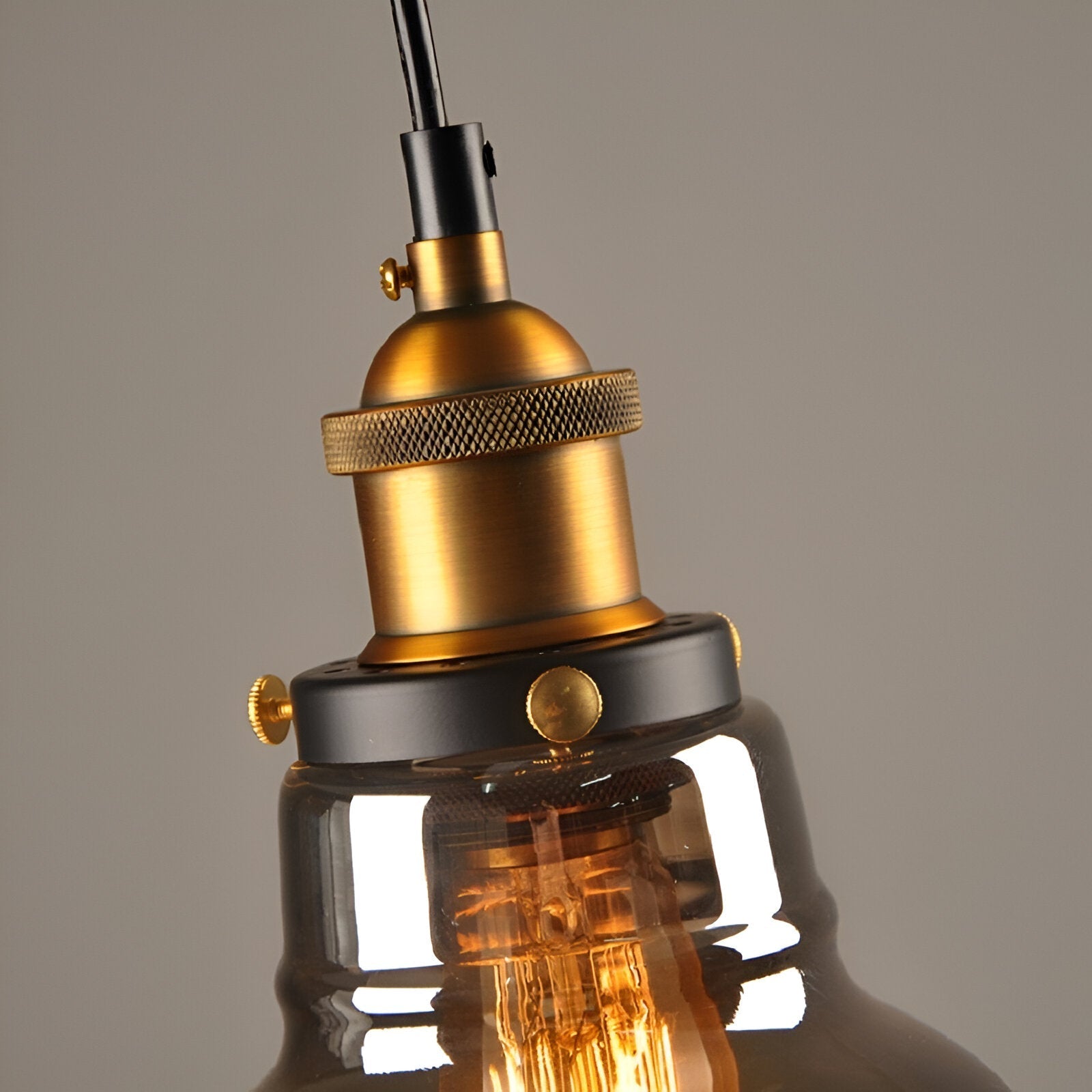 Tinted glass hanging pendant light with brass fitting