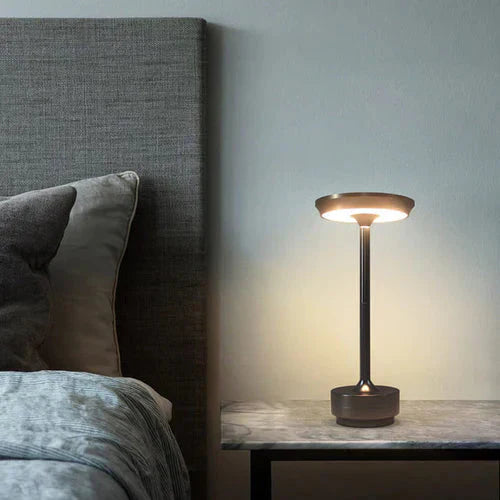 Wireless table lamp with circular metal shade