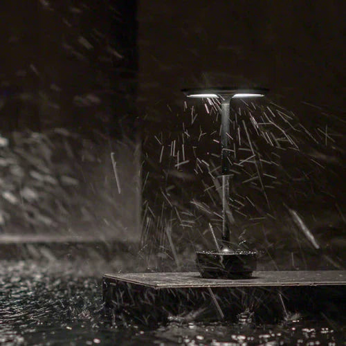 Wireless table lamp with circular metal shade