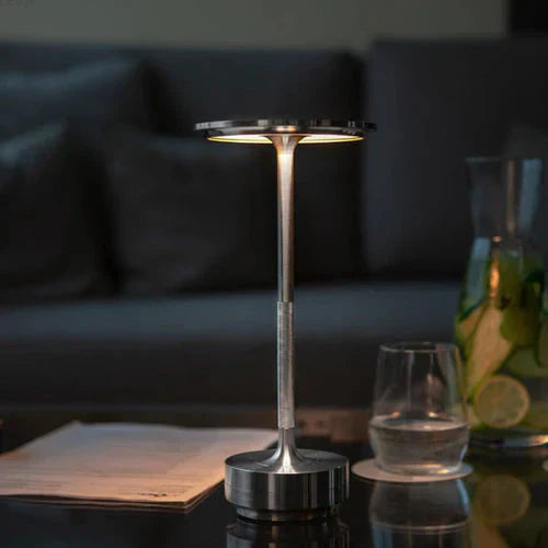 Wireless table lamp with circular metal shade